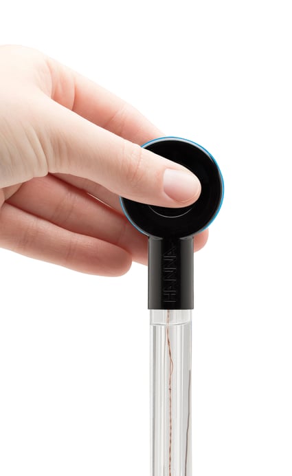Hand holding a halo wireless pH meter 